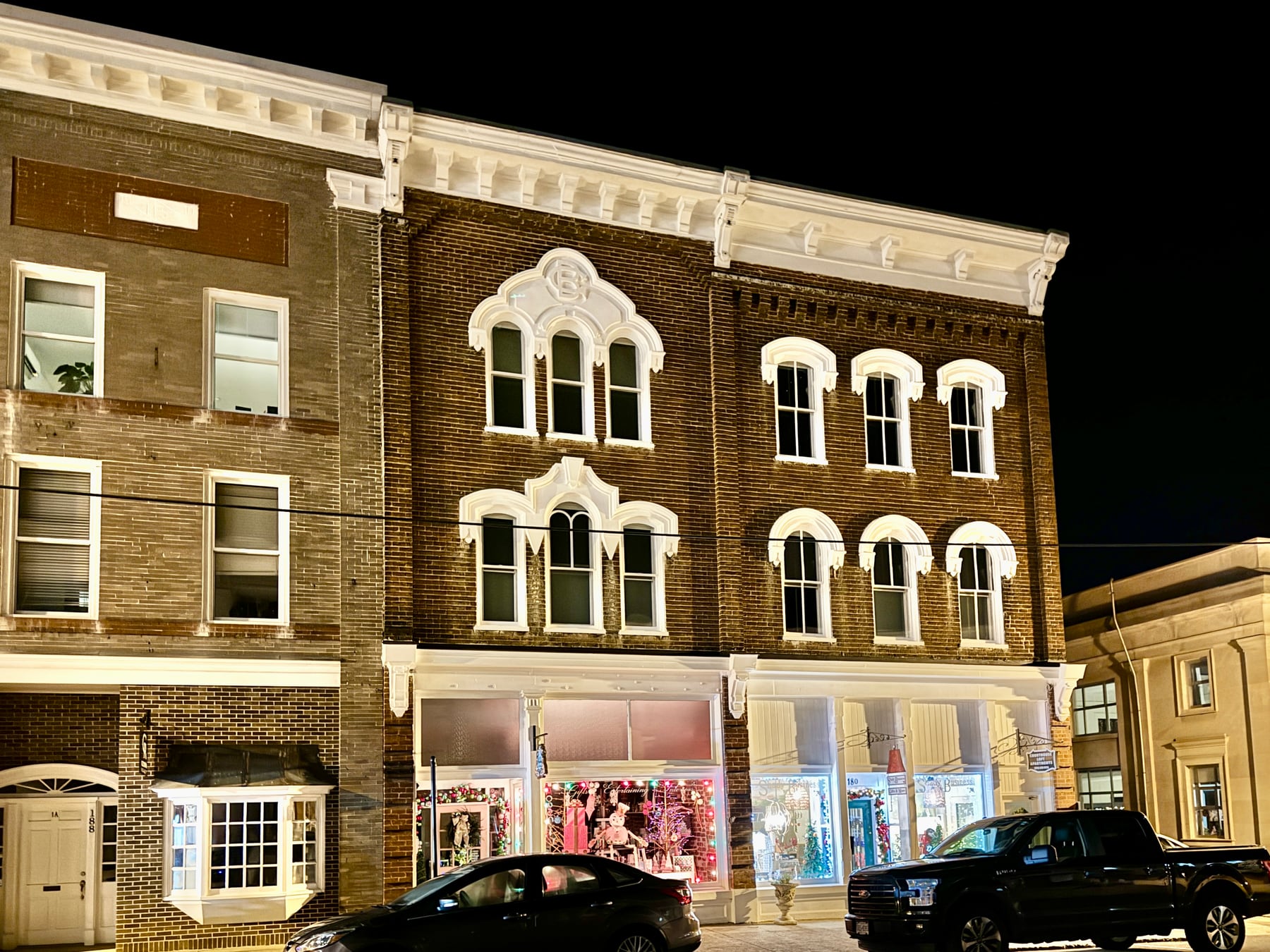 Historic storefronts at Main Street and Court Street in downtown Abingdon, Virginia, at night