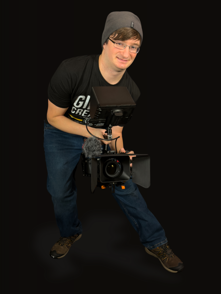 Michael Gibson working with his professional video camera